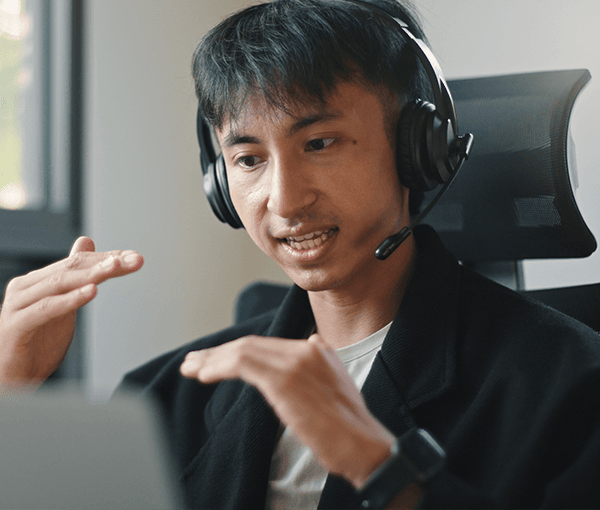 Man explaining a topic while talking on a webcast