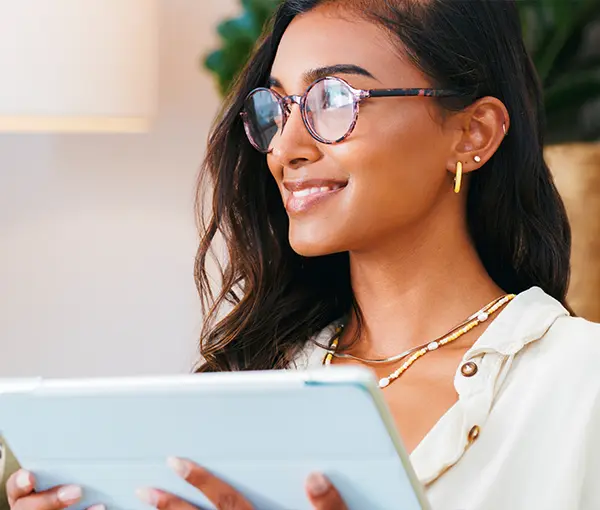 Woman Smiling with Laptop