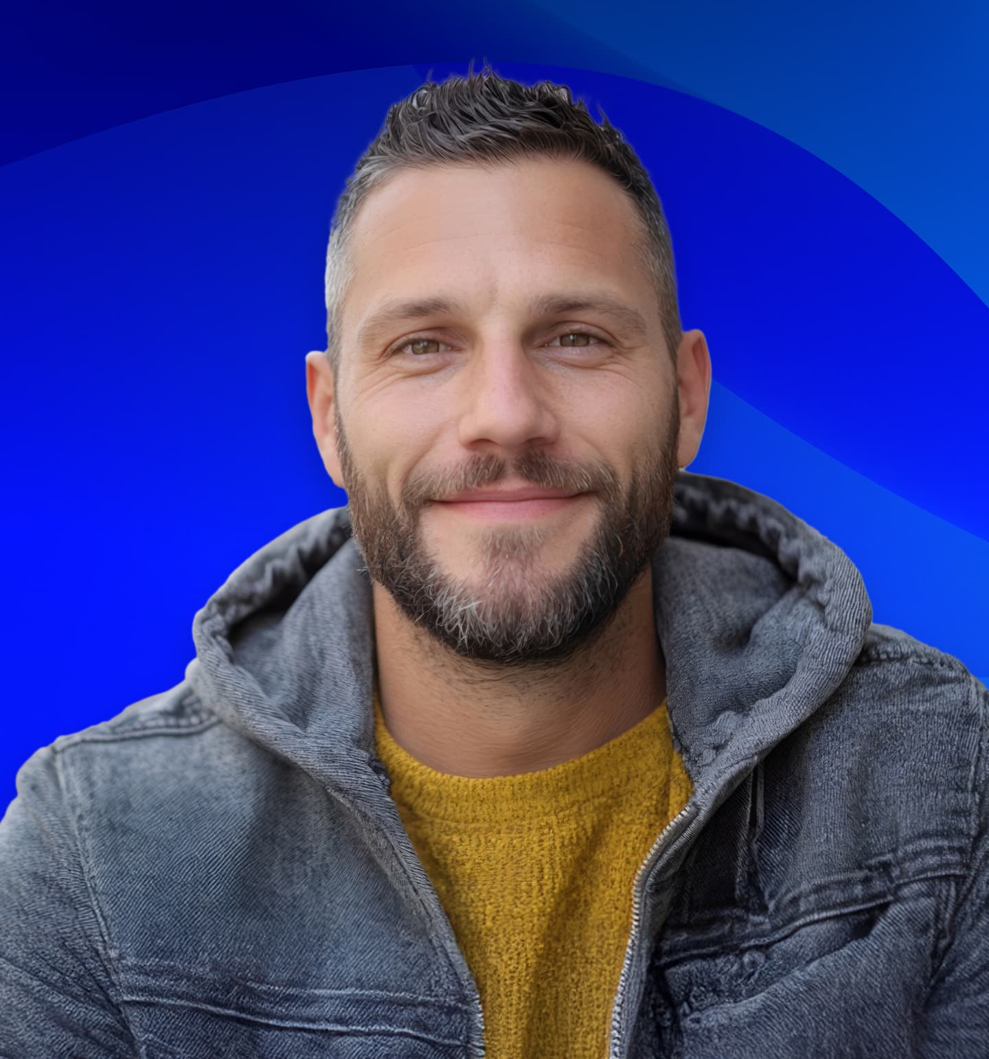 Man Smiling in a Hoodie