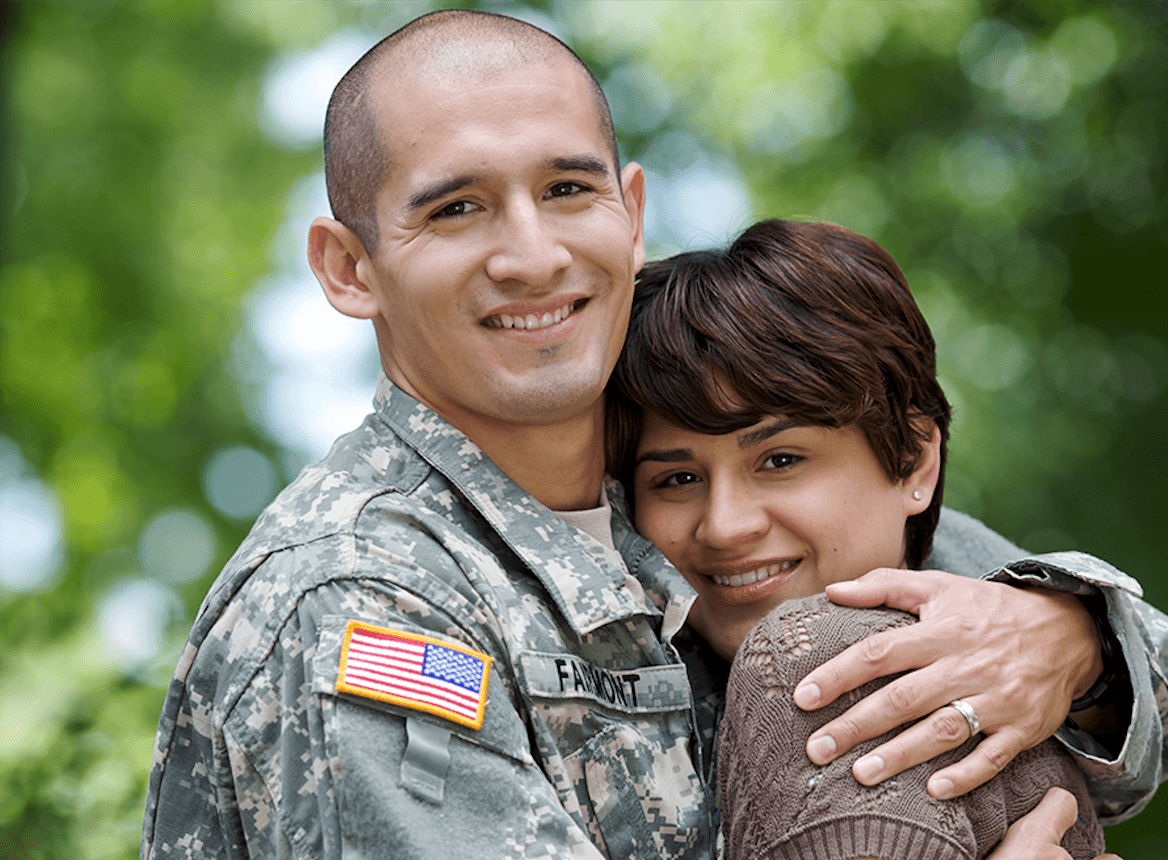 Solider Embracing Wife
