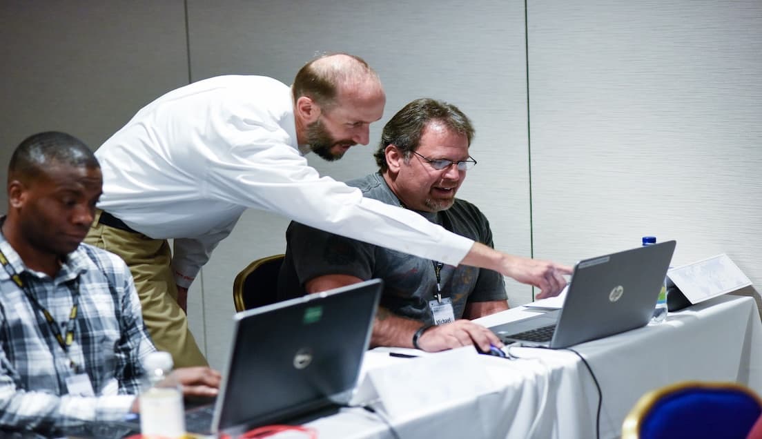 Instructor Helping Student