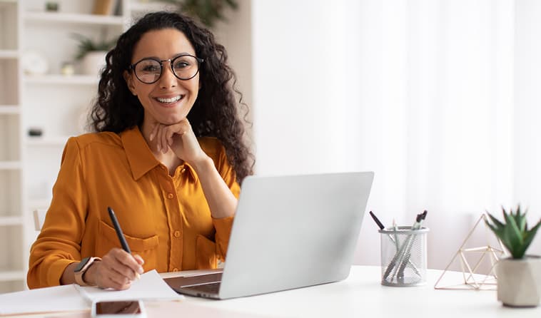 Hispanic working on laptop