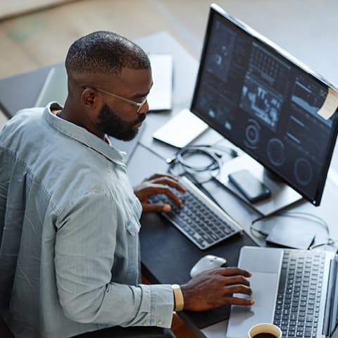 Man Using A Computer