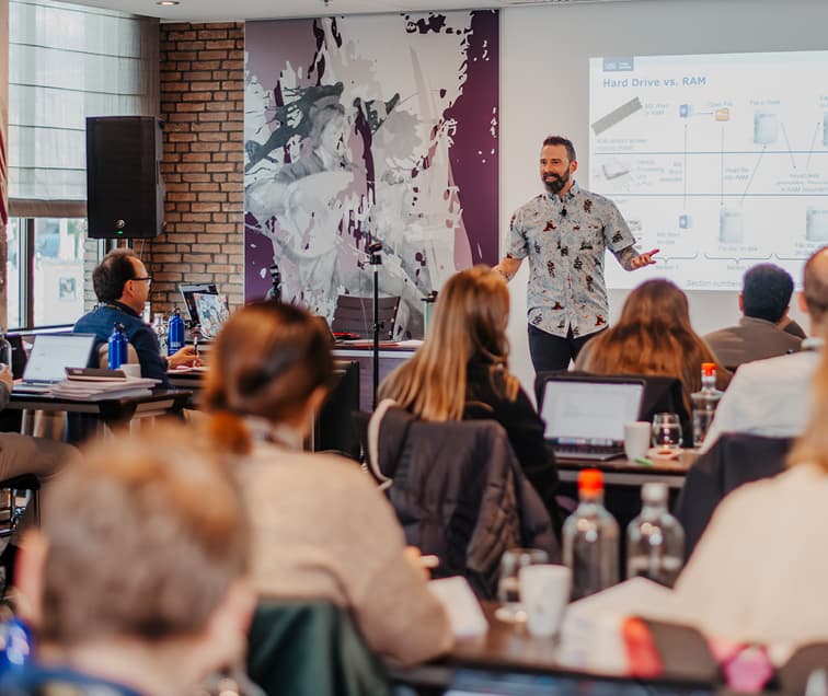 Rich Greene: Instructor Smiling and Teaching A Class