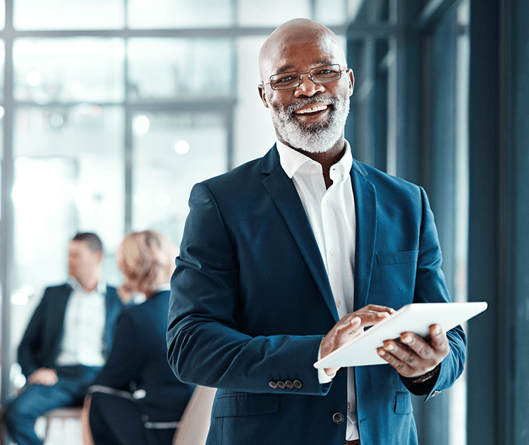 CISO holding a tablet.