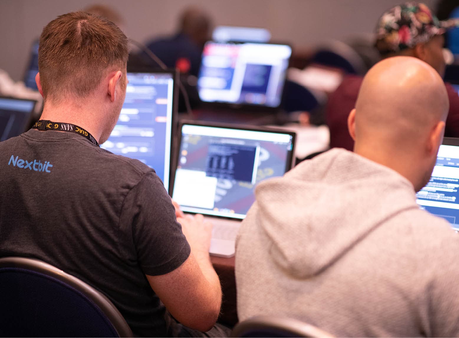 Two Men at Laptops Training