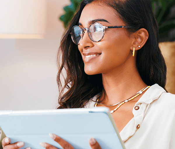 Woman Smiling with Laptop