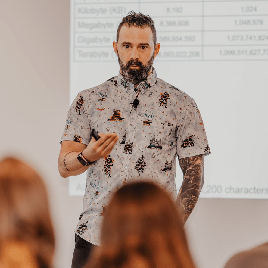 Rich Greene: Instructor Wearing Serious Expression as He Explains a Concept