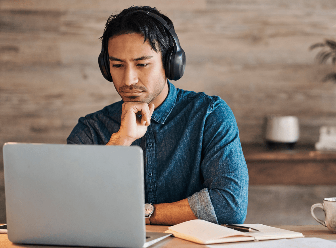 Person watching webcast on screen