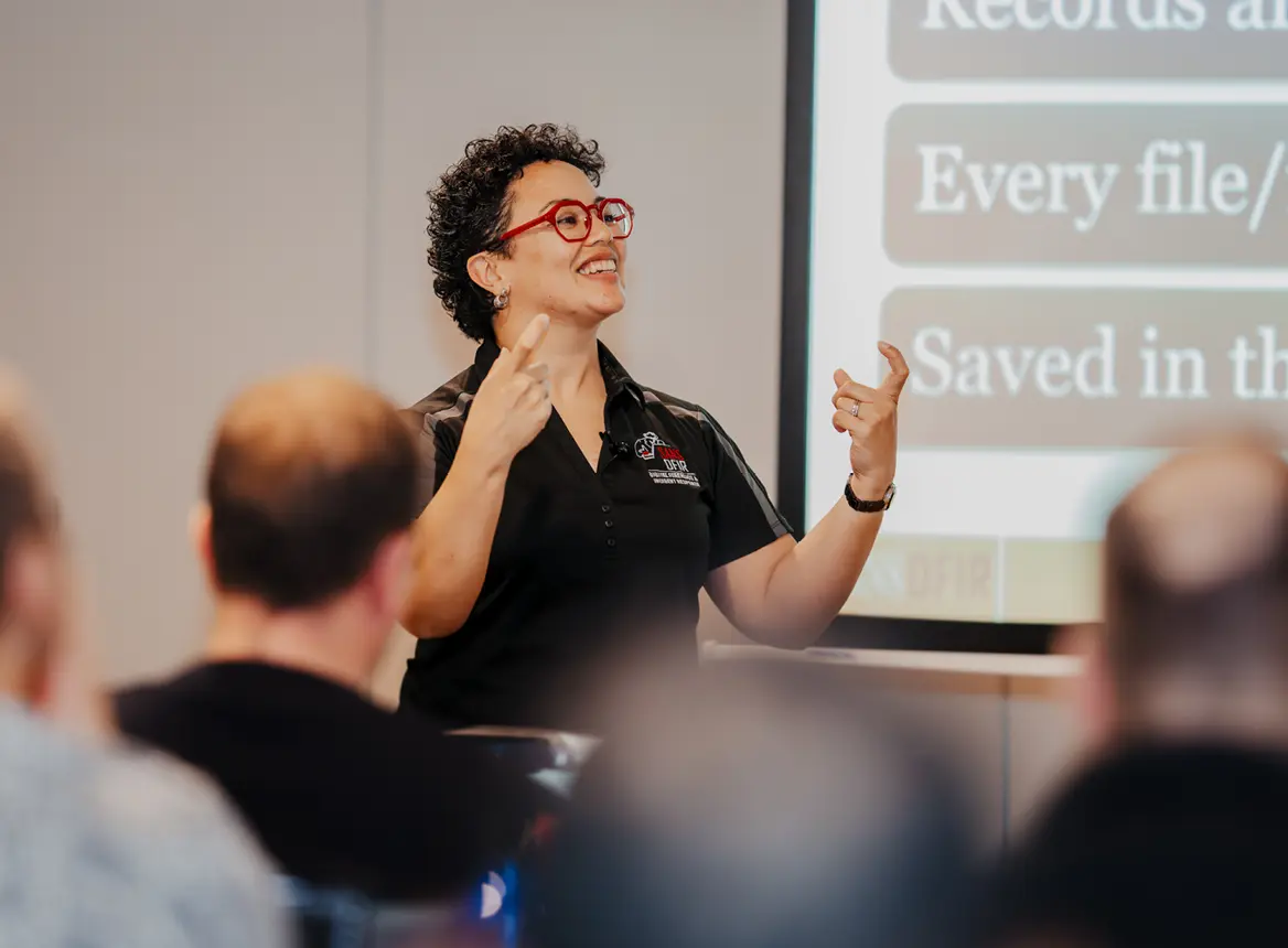 Lodrina Cherne: Woman Instructor Teaching in Classroom